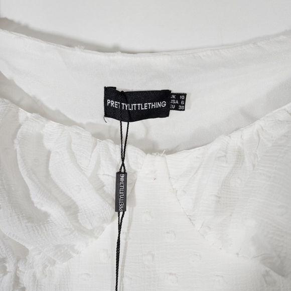 ✅️ Pretty Little Thing White Dobby Mesh Cup Detail Long Sleeve Crop Top - Picture 6 of 8